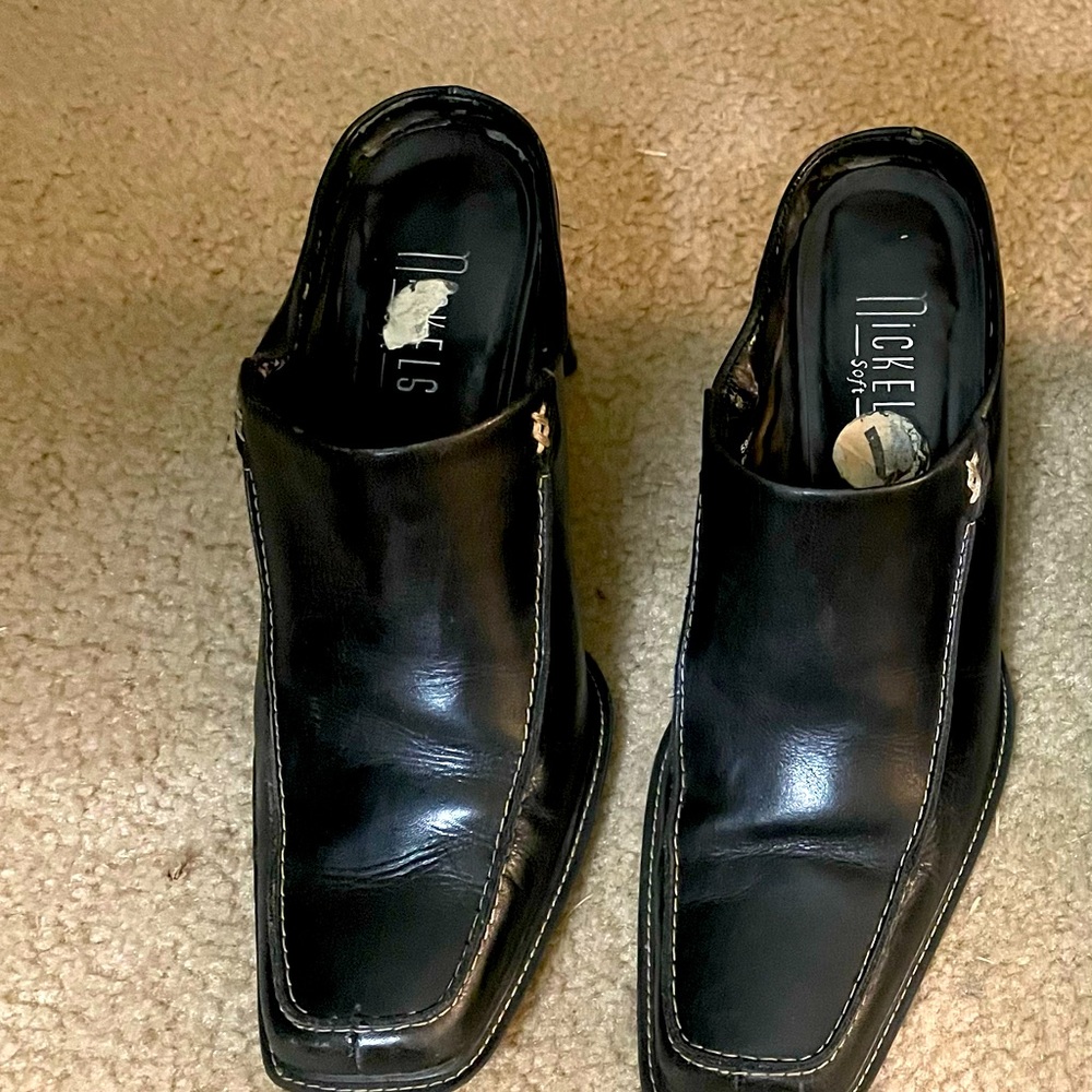 Black leather mules, size 7M. Nickel brand.